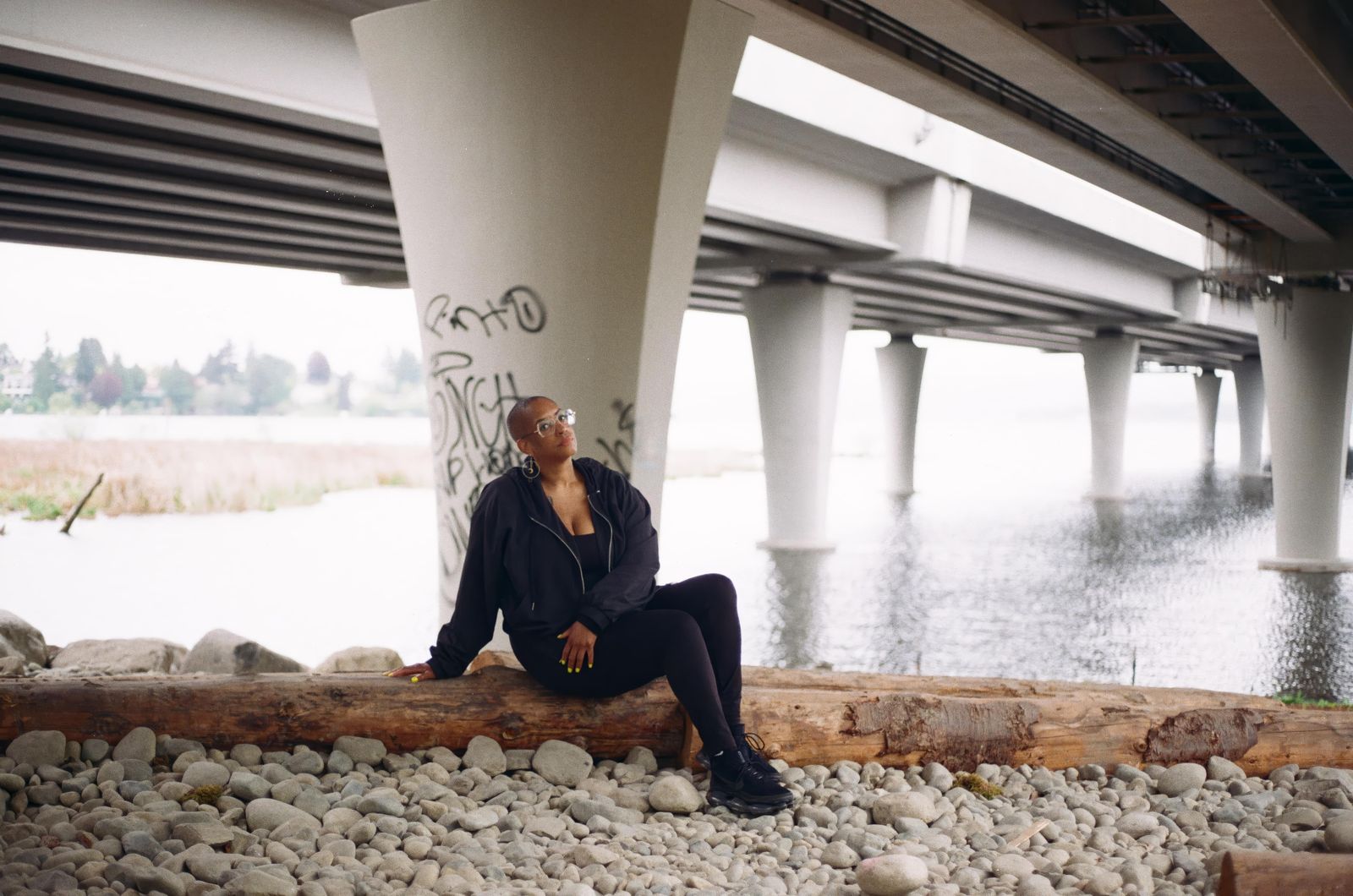 Sharlese sitting by the water